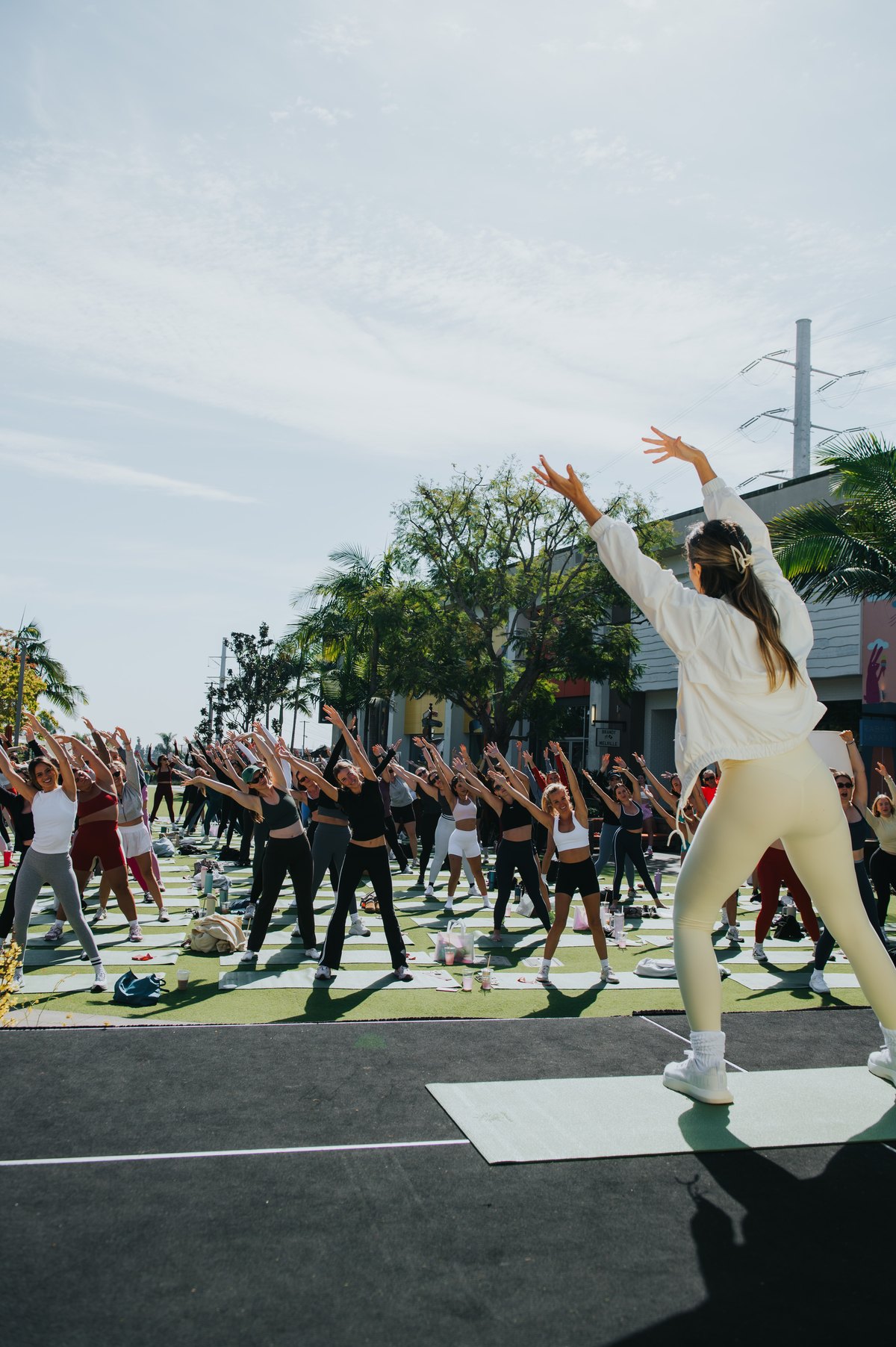 Katie Austin leading an outdoor community workout